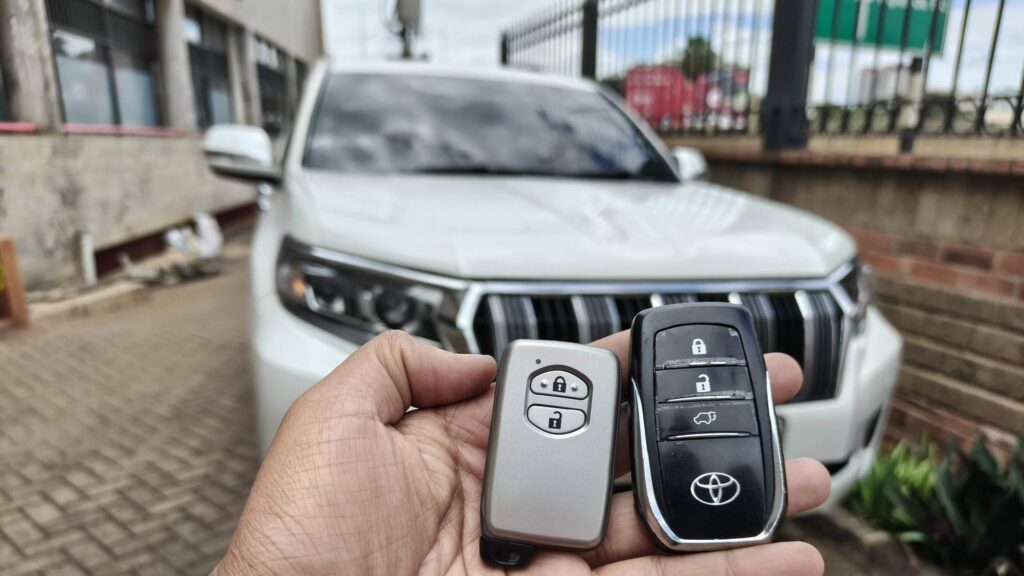 Two Toyota smart keys, an original and a spare, programmed by Carkey Masters in Nairobi